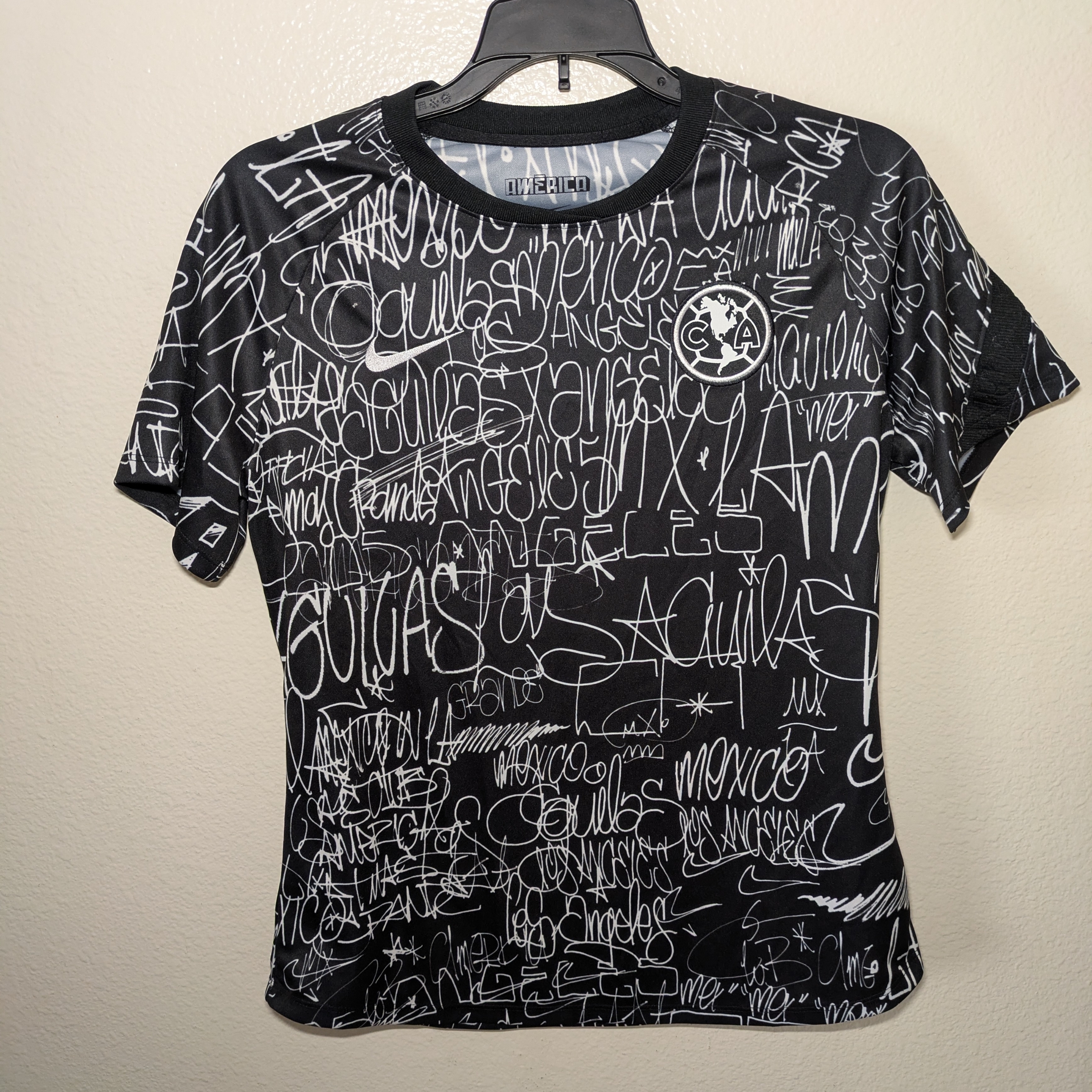 Nike Club America Women's Black And Gray Graphic Tee